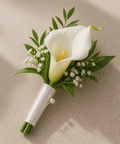 White calla lily boutonniere with greenery in abu dhabi