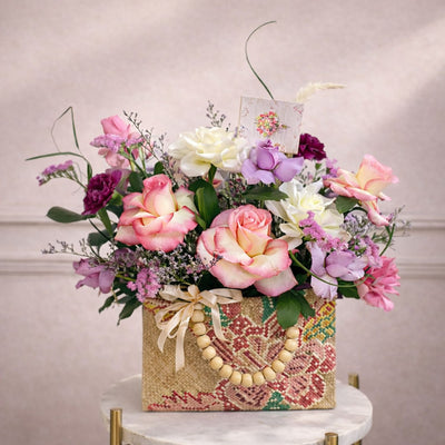 bouquet of flowers in a handbag