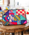 Handmade patchwork laptop sleeve bag from the Philippines – eco-friendly artisan bag.background