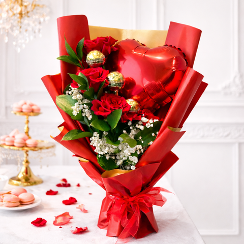 Luxury red roses bouquet with chocolates and heart balloon on a white classy background