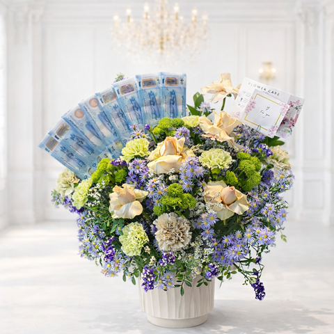 Luxury money bouquet with fresh flowers and cash notes arrangement by Danaya’s Flowers Abu Dhabi