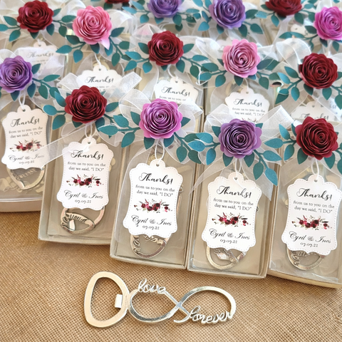 Personalized infinity love forever bottle opener wedding favors with handmade paper roses and thank you tags for bridal souvenirs in UAE