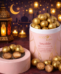 Ramadan macadamia milk chocolate gold dusted gift box with lantern and flower arrangement in Abu Dhabi