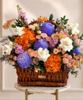 Luxury flower basket arrangement with hydrangeas, roses and chrysanthemums in Abu Dhabi